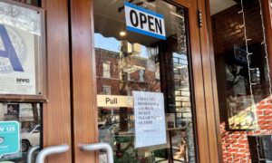 Restaurant grades sign and open door sign